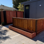 new wooden fence and backyard studio
